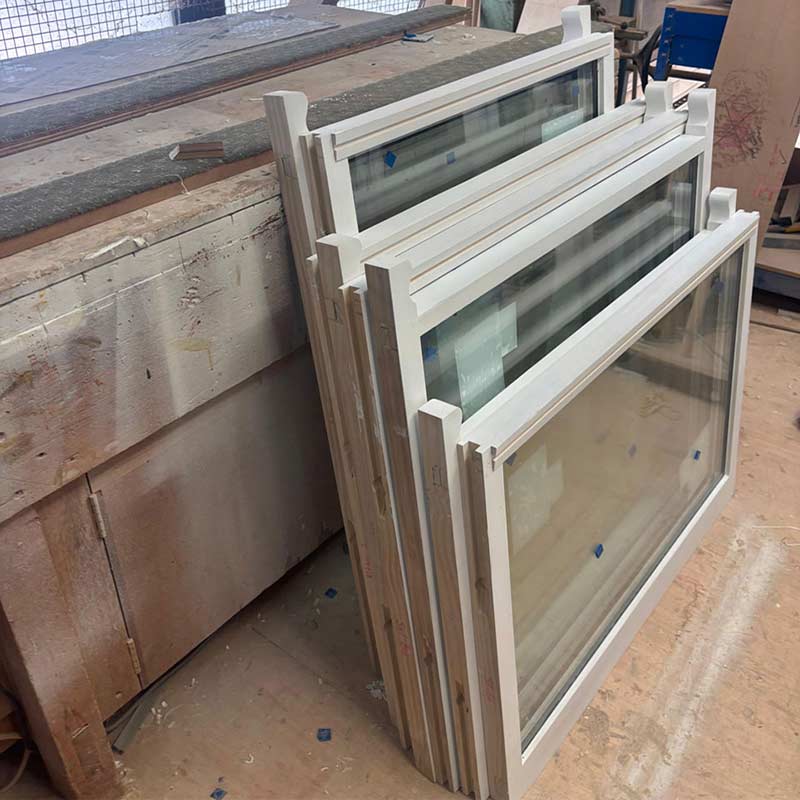 New Accoya timber sash windows prepared in the workshop for installation in Clevedon.