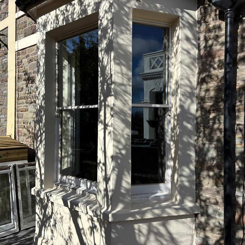 Restored timber sash window on a period home in Clevedon after renovation.
