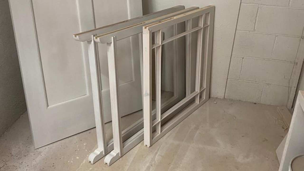 Slimline double glazed  replacement sashes with traditional glazing bars and timber detailing